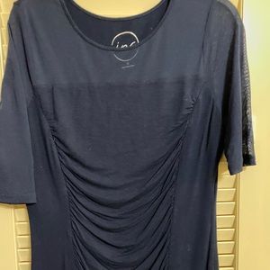 Nice navy top with slightly sheer sleeve.